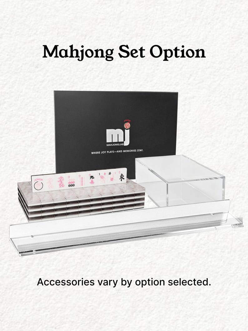 The image is an advertisement for a "Mahjong Set Option" that includes a black box with the "Mahjong" logo and the text "Where Joy Flats-And Memories Stax." The set includes various accessories, and the image emphasizes that accessories vary by option selected.