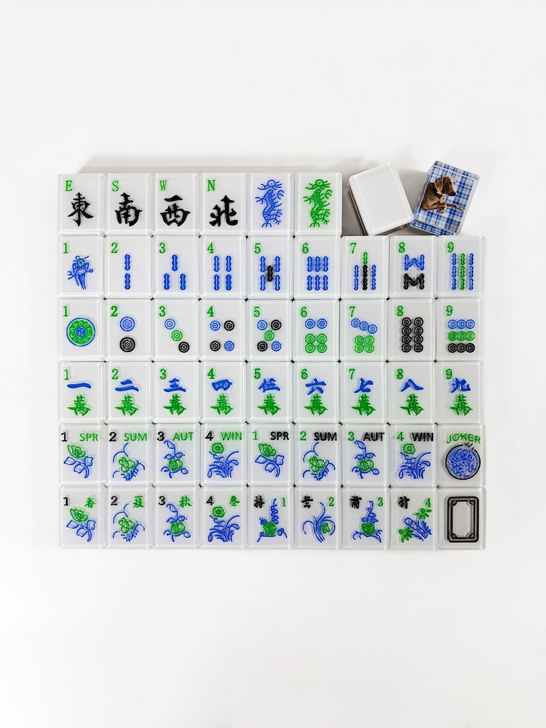 a grid of tiles with various symbols and numbers on them, arranged in a visually appealing layout.