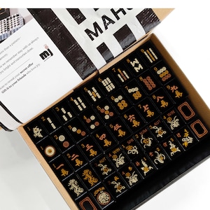 a box containing a set of mahjong tiles, with the text "Mahjong Set Only" visible.