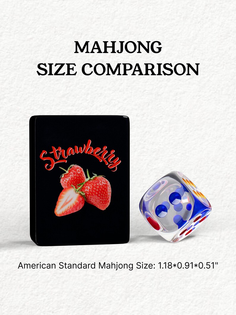 The image is a comparison of the size of a card with a strawberry and a dice. The card has a strawberry design, and the dice has a blue and white design. The card is labeled as "American Standard Mahjong Size: 1.18*0.91*0.51", indicating that the card is 1.18 inches by 0.91 inches, and the dice is 1.18 inches by 0.91 inches.