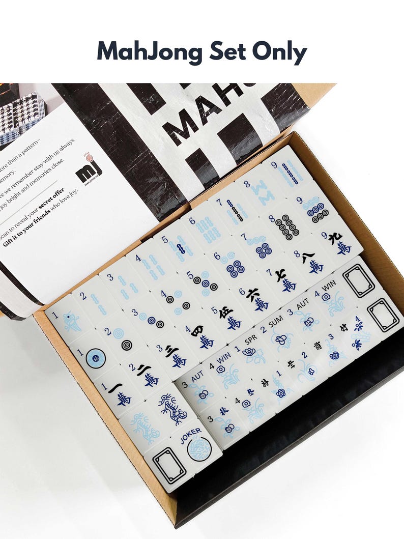 a set of mahjong tiles in an open box, with the text "Mahjong Set Only" visible.