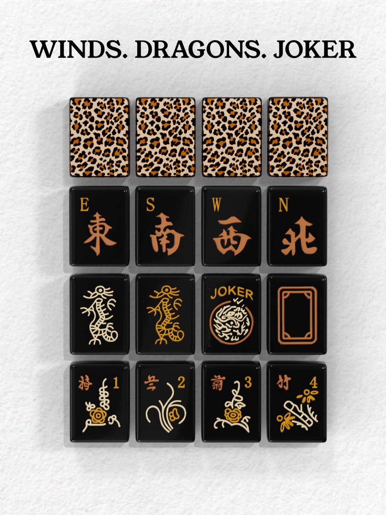a collection of black tiles with various designs and patterns, including leopard print, Chinese characters, and the word "JOKER".