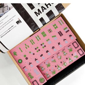 a set of mahjong tiles in a box, with the text "Mahjong Set Only" visible.