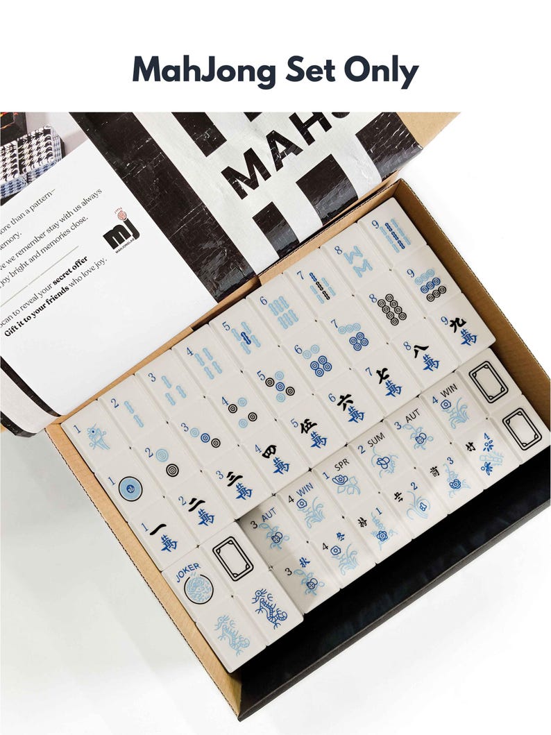 a set of mahjong tiles in an open box, with the text "Mahjong Set Only" visible.