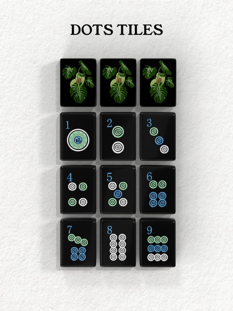 A collection of black tiles with various designs and numbers on them, arranged in a grid pattern.