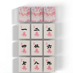 a collection of tiles with characters on them, arranged in a grid pattern.
