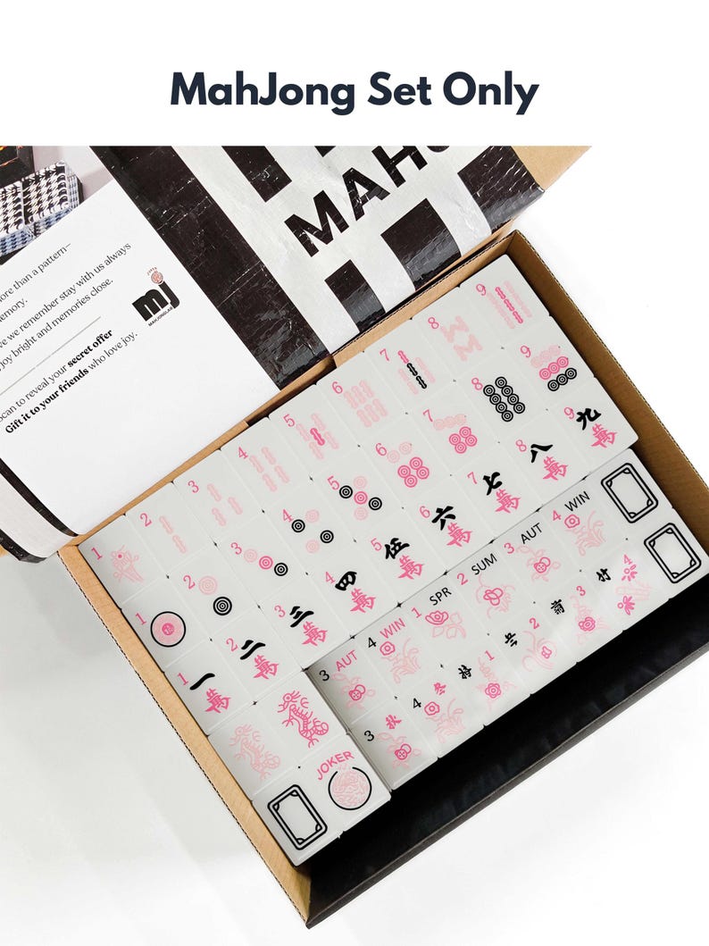 a set of mahjong tiles in an open box, with the text "Mahjong Set Only" visible.