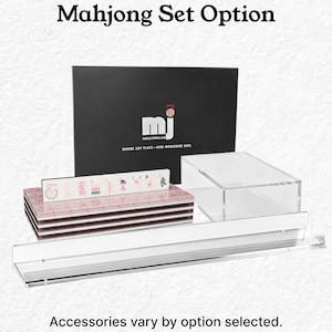 a set of Mah Jongg tiles and a clear plastic tray, with the text "Mahjong Set Option" and "Accessories vary by option selected."