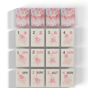 a collection of tiles, each with a different design and number, arranged in a grid pattern.