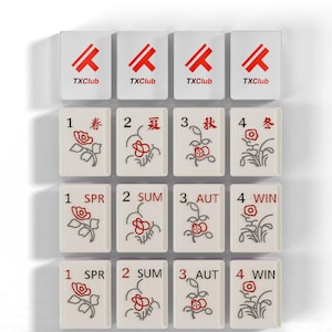 a collection of tiles, each with a different design and text, arranged in a grid pattern.