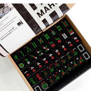 a box containing a set of mahjong tiles, with the text "Mahjong Set Only" visible.