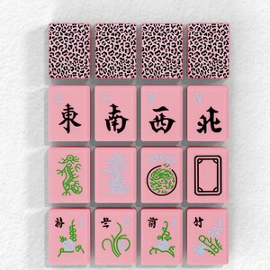 The image is a collage of various pink and green tiles, each featuring different Chinese characters and symbols, such as winds, dragons, and the Joker.