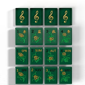 a collection of green tiles with musical notes and flowers on them, arranged in a grid pattern.