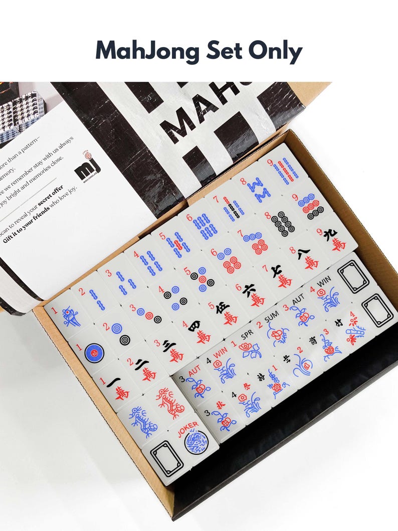 a set of mahjong tiles in an open box, with the text "Mahjong Set Only" visible.
