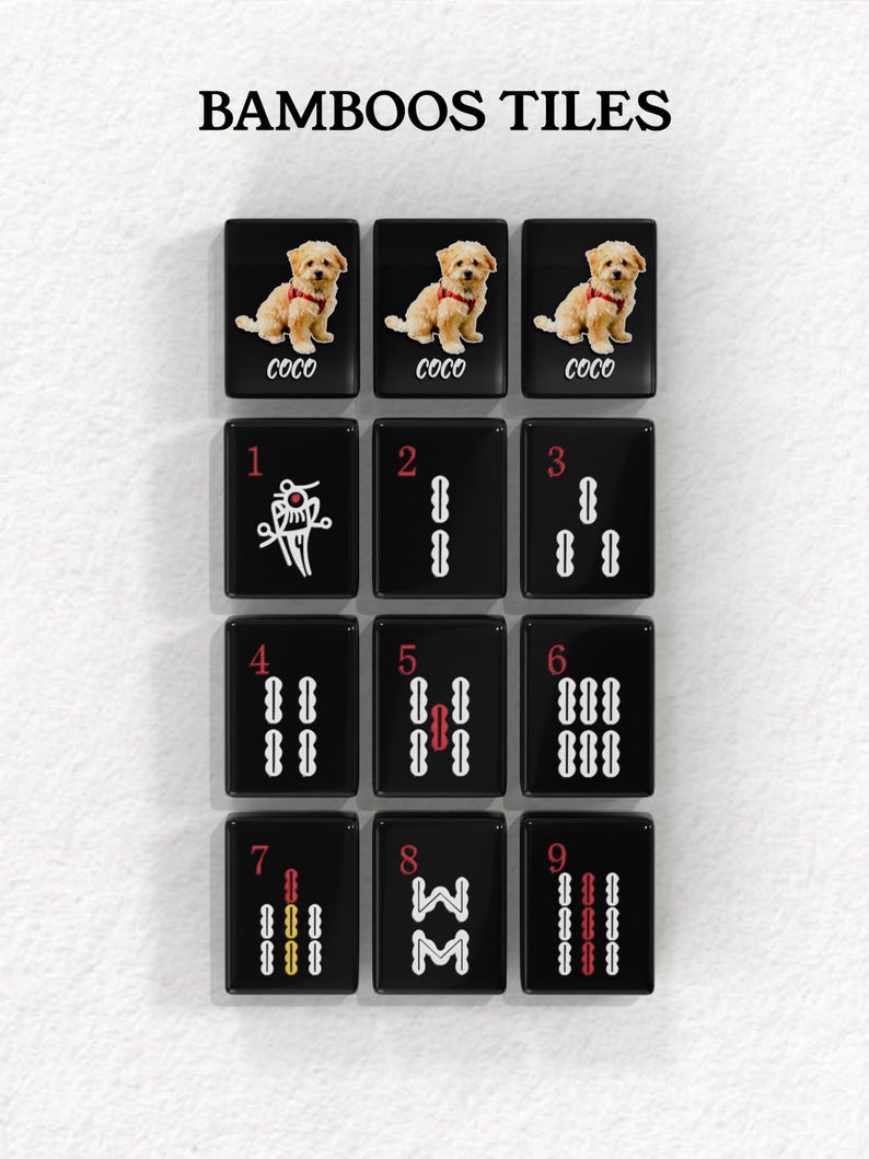 a collection of black tiles with various images and numbers on them, arranged in a grid-like pattern.