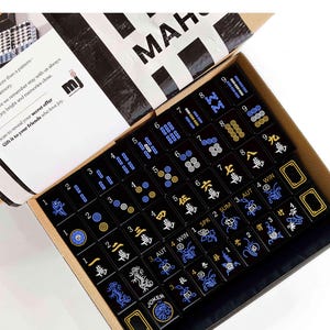 a box containing a set of mahjong tiles, with the text "Mahjong Set Only" visible.