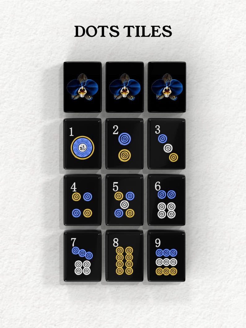 a collection of black tiles with various designs and numbers on them, arranged in a grid pattern.