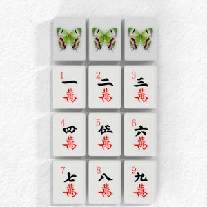 a collection of tiles with characters on them, arranged in a grid pattern.
