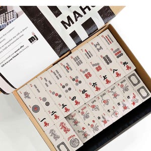 a set of mahjong tiles arranged in a box, with the text "Mahjong Set Only" visible.