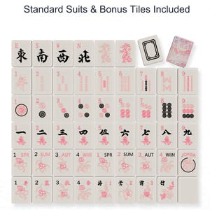 The image is a set of playing cards with various suits and numbers, including a joker, a king, a queen, a jack, and a ten.