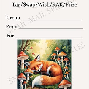以下が含まれることがあります： 「You have received a... Tag/Swap/Wish/RAK/Prize」のテキストが入った、気まぐれなカード。森の中でキノコに囲まれて眠るキツネが描かれています。「Please post once received. Enjoy!」のテキストが下部にあります。
