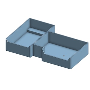 Könnte beinhalten: Ein hellblaues, 3D-gerendertes Organizer mit zwei Hauptfächern und einem kleinen Regal. Das Design ist geometrisch und modern, geeignet für die Schreibtischorganisation. Die Abmessungen betragen ca. 15 cm lang, 10 cm breit und 5 cm hoch.
