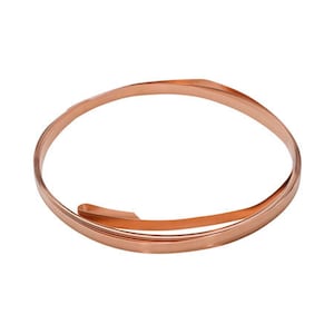 May include: A coil of copper wire, a crafting supply for jewelry making and other projects.