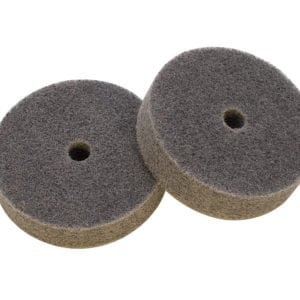 May include: Two grey and brown sanding pads with a hole in the centre.