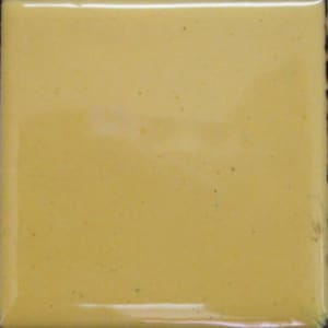 Peut inclure: Un carreau de céramique jaune uni avec une finition lisse et brillante.