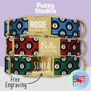 May include: Three pet collars featuring a repeating pattern of black eight balls on blue, red, and green backgrounds. Each collar has a gold-tone metal side-release buckle engraved with a name and phone number, including ROSIE, Bella, and SIMBA.