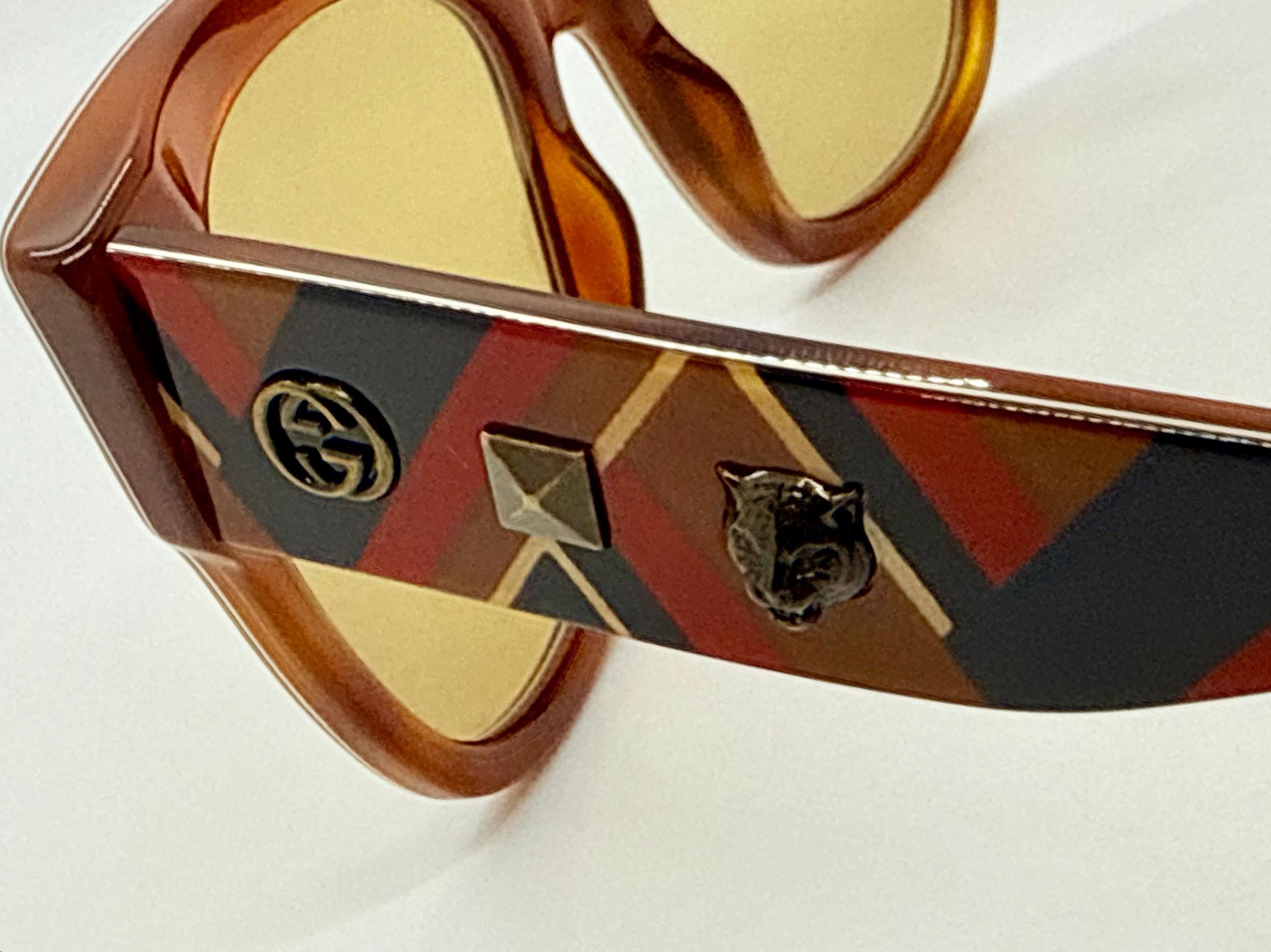 Gucci GG0059S 003 Cat Eye Sunglasses Tortoise Stripe Studded Arms Gucci Gg0059s 003 Amber Tortoise Geometric Sunglasses W  main image 4