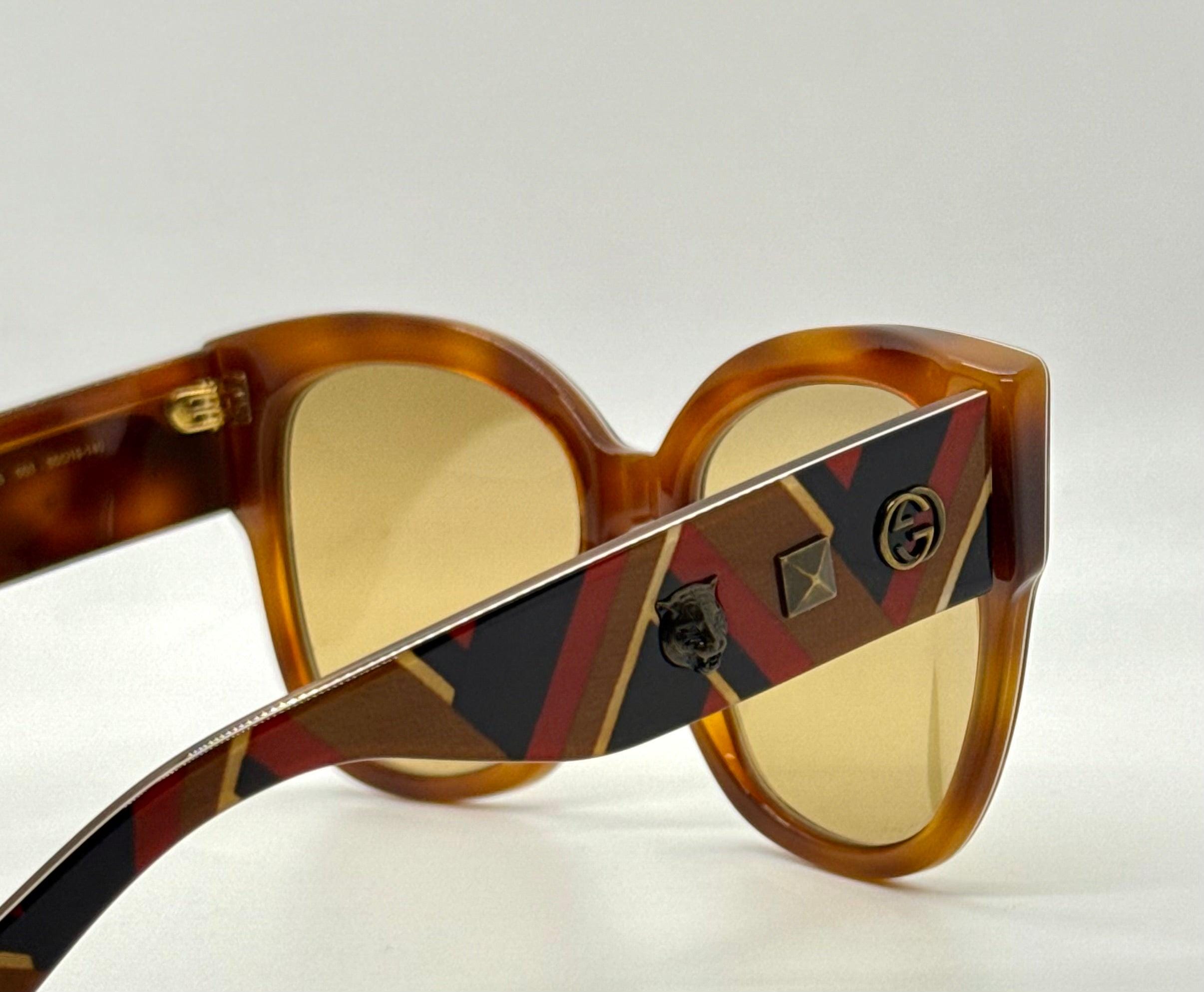Gucci GG0059S 003 Cat Eye Sunglasses Tortoise Stripe Studded Arms Gucci Gg0059s 003 Amber Tortoise Geometric Sunglasses W  main image 2