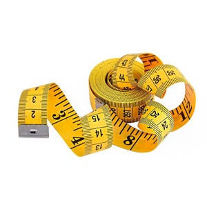 May include: A yellow measuring tape with black markings, showing inches and centimeters. The tape is coiled and unraveled, displaying numbers from 1 to 44 inches. The tape has a metal end piece.