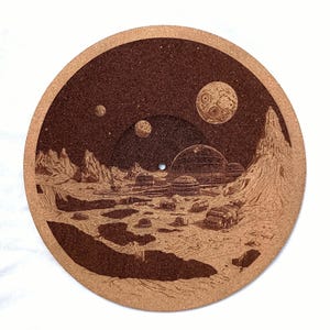 May include: A set of three ceramic mugs with a speckled, matte finish. Each mug features a different color: light blue, cream, and gray. The mugs have a simple, modern design with a rounded shape and a comfortable handle.