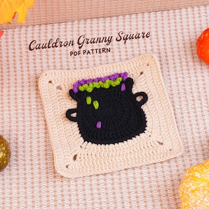 May include: A square crochet piece featuring a black cauldron with green and purple bubbling liquid, centered on a beige background. The text "Cauldron Granny Square PDF PATTERN" is printed above the crochet square in a dark brown font.