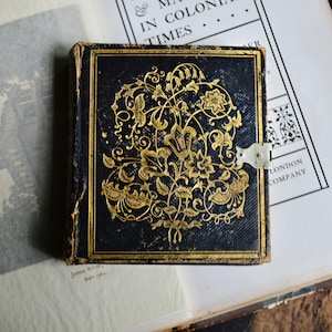 Antique Daguerreotype Leather Case / Sixth Plate Daguerreotype of Man in Book Style Case the Spine reads Souvenir