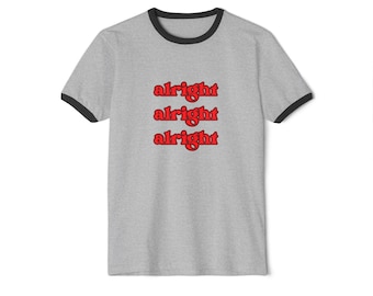 May include: A grey ringer t-shirt with a black collar and cuffs. The shirt displays the word "alright" in red, repeated three times vertically.
