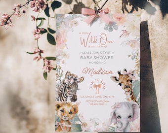 May include: Baby shower invitation featuring a floral design and watercolour illustrations of a zebra, giraffe, lion, and elephant. The invitation reads "A little Wild One is on the way" and includes the name "Madison".