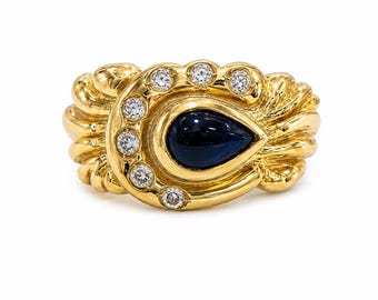 14 kt geelgouden ring, peervormige saffiersteen, 7 diamanten, maat 7