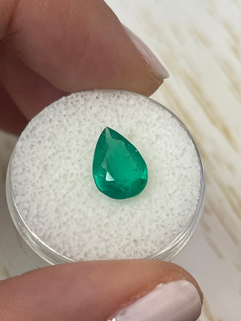 Timeless Teardrop Charm: 1.87 Carat Pear Cut Colombian Emerald