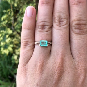 Birthstone Charm: Emerald Engagement Ring for Celebrating Nature's Beauty