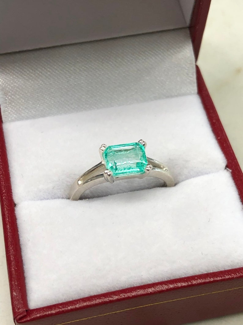 Eternal Beauty: Emerald Engagement Ring with 1.25 Carat Brilliance