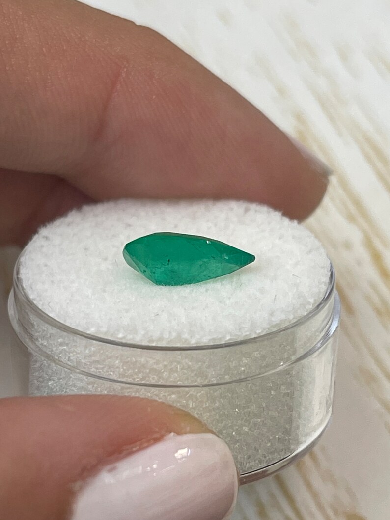 Enchanting Green Gem: 1.87 Carat Pear Cut Emerald