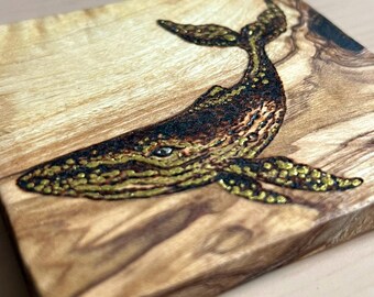 Humpback Whale Pyrography Coaster – Hand Burned Olive Wood Art with Gold Detail