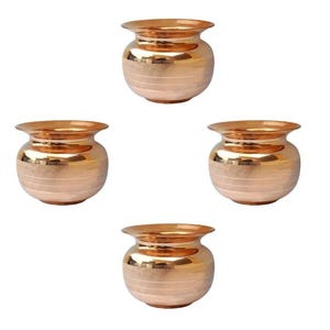 May include: Four copper-colored pots with a rounded body and a flared rim. Each pot has horizontal etched lines around the body. The pots are arranged against a white background.