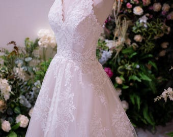 Romantic Lace Wedding Dress with Deep V Neck, Sleeveless A Line Bridal Gown with Scalloped Details, Elegant Vintage Style