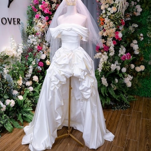 Off Shoulder Satin Wedding Dress with Ruffle High-Low Skirt, Unique Modern Bridal Gown with Train for Elegant Ceremony Look