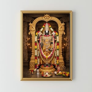 May include: A framed print of a Hindu deity, adorned in gold and colorful garlands, stands within an ornate golden archway. The statue is dark-skinned and richly decorated, with intricate details. The background features candles and architectural elements.