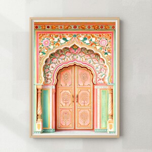 May include: A framed print depicting a detailed, colourful architectural design. The artwork features a pink arched doorway with ornate floral and tree-like patterns. The frame is a light wood colour, and the design is vibrant with pink, orange, green, and white hues.