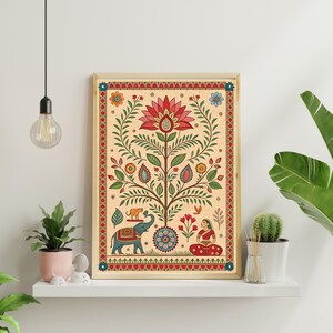 May include: A framed art print featuring a vibrant, stylized tree with a large red lotus flower at the top. The artwork includes an elephant, a meditating figure, and intricate floral and geometric patterns in shades of red, blue, and green.